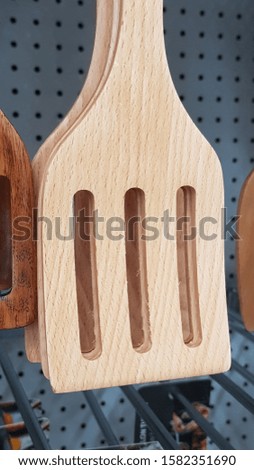 Teakwood spatula. Kitchenware for sale in the shop.