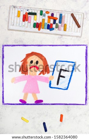School grades. Sad student with exam or test result. Girl holding report card with F grade. Photo of colorful hand drawing. 