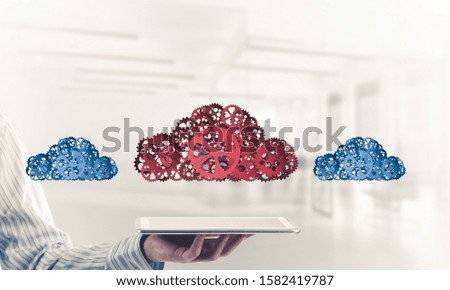 Close of businessman presenting tablet pc and cloud computing concept. Mixed media