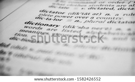 Dictionary definition close up book Royalty-Free Stock Photo #1582426552