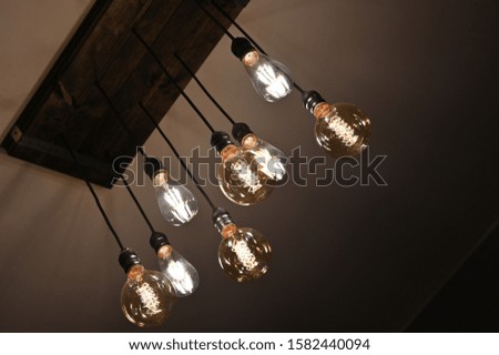 Beautiful retro luxury interior bulb lighting lamp decor glowing in dark.