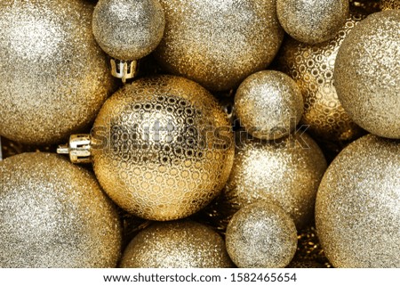 Background of golden christmas baubles