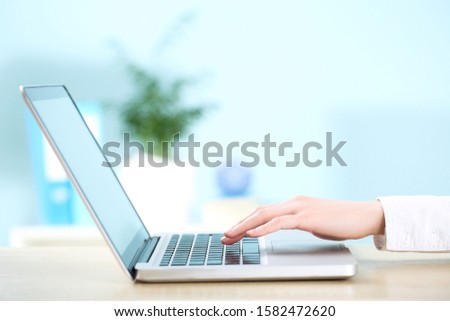 Office worker working on a laptop