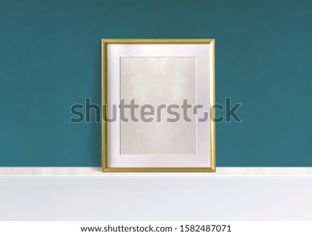 White and gold decoration frame image mockup.  Green background.