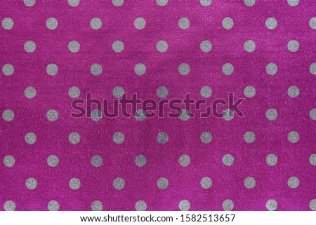 Seamless shiny polka dot wrapping paper. Violet foil for design of gift wrapping, wrapping paper, wallpaper. Stylish shiny texture