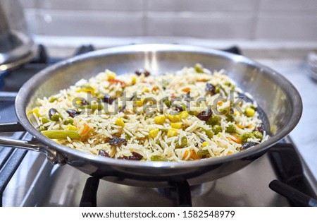 risotto cooked in a skillet in the kitchen                        