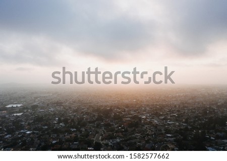 A beautiful aerial shot of the city under a clear sky