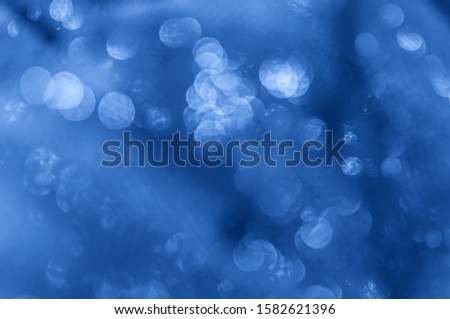 Abstract background representing the color of the year 2020 classic blue. Toned photo.