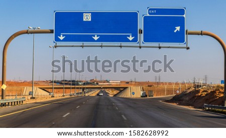 Traveling by car on desert roads