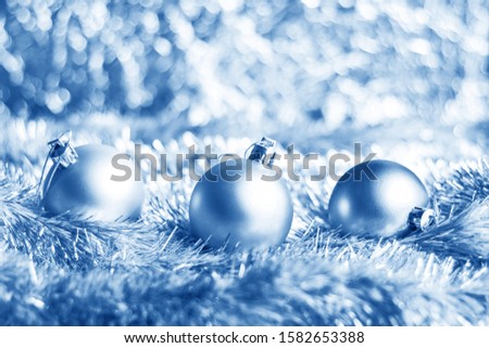 Christmas balls on shiny background. With selective focus