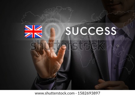 United Kingdom success concept. Man pressing virtual button with flag icon