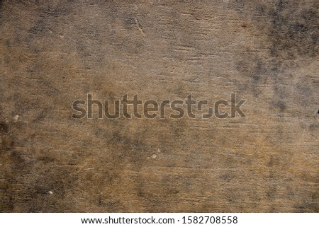 Brown sandstone wall texture details. Close-up photo of gritty background. Horizontal orientation Royalty-Free Stock Photo #1582708558
