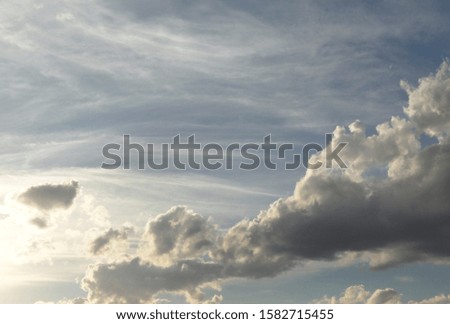 beautiful sky with clouds illuminated by the sun
