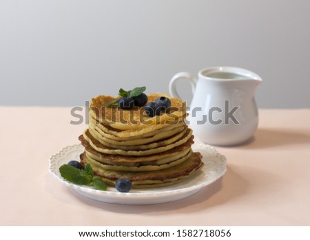 Pancakes with blueberries on a plate