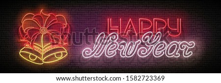 Glow Greeting Card with Two Christmas Bells, Bow and Inscription. Happy New Year Postcard Template. Shiny Neon Light Poster, Flyer, Banner. Brick Wall. Vector 3d llustration. Clipping Mask, Editable