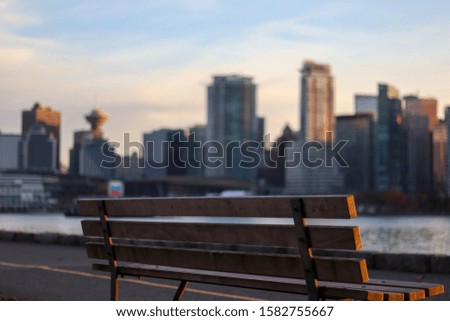 Vancouver skyline from park bench