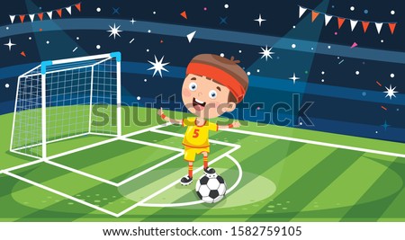 Little Football Player Posing With Ball