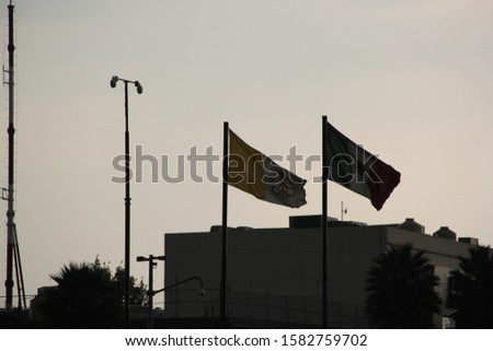mexico flag waving on tower