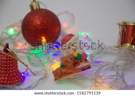 Christmas motivational decoration with balls and Santa Claus