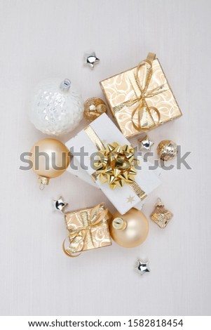 Christmas composition. Christmas gift boxes with Christmas balls on white background. Christmas, winter, New Year concept