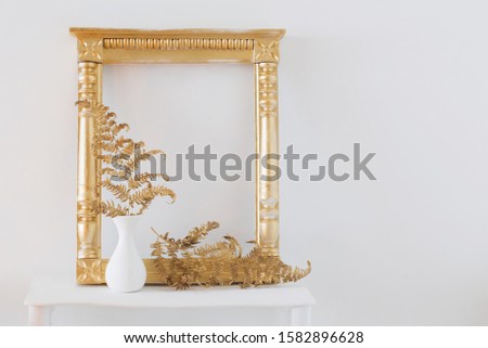 interior decor with burning candles on white wooden shelf