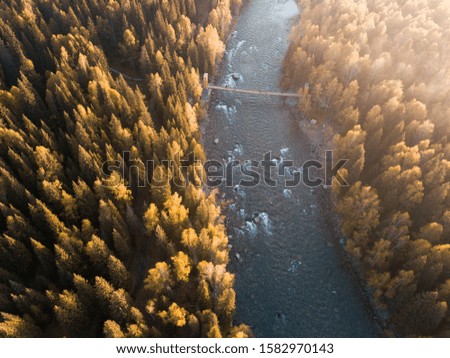 Aerial view of Hemu village, an old village in Altai mountain,Xinjiang,China, with fog. Autumn in Altai