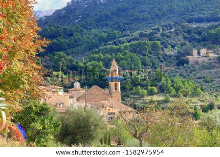 The photo was taken on the island of Palma de Mallorca, in a small village called Valldemossa. Pictured is the bell tower of the old church.