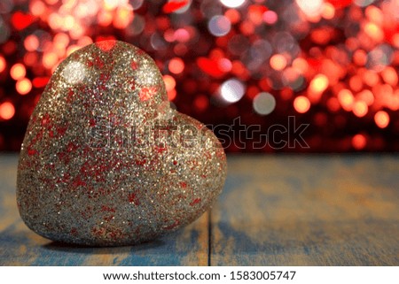  beautiful shiny heart with gift and shiny background