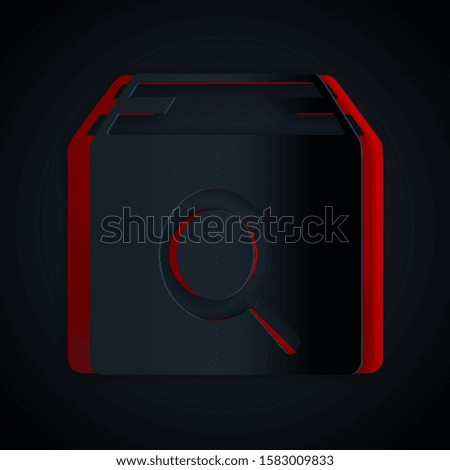 Paper cut Search package icon isolated on black background. Parcel tracking symbol. Magnifying glass and cardboard box. Logistic and delivery. Paper art style. Vector Illustration