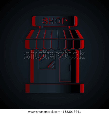 Paper cut Shopping building or market store icon isolated on black background. Shop construction. Paper art style. Vector Illustration