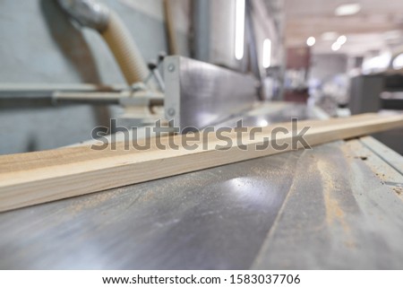 Background carpentry woodworking woodshop, machines and tools, wooden boards, furniture details Royalty-Free Stock Photo #1583037706
