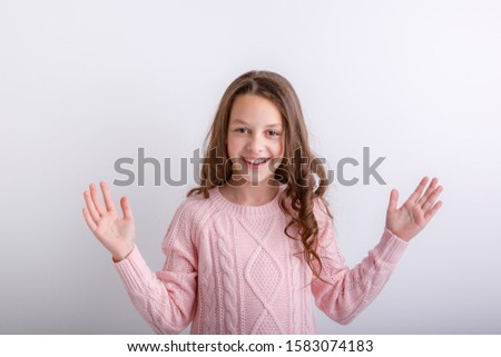 little brunette girl shows different emotions joy, sadness, surprise isolated on white background