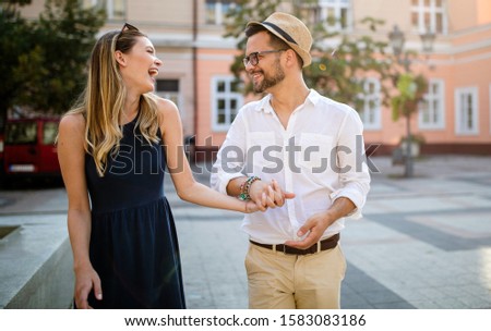 Happy romantic couple in love having fun outdoor in summer day