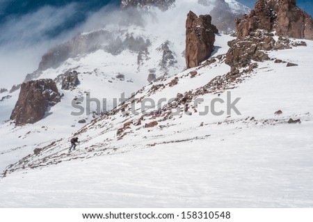 Skier on slopes of Mount Kazbek