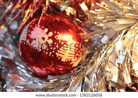 Decorative Christmas tree toy macro photo shining background