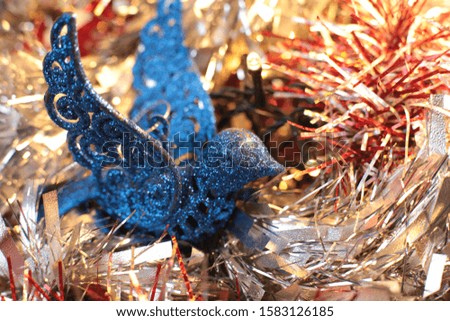 Decorative Christmas tree toy macro photo shining background