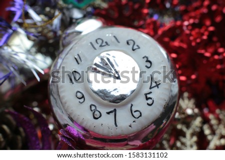 Christmas ball and garland on the Christmas tree festive shiny background