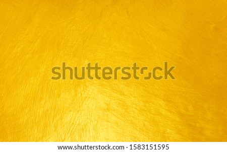 Golden wall plaster glitter texture background