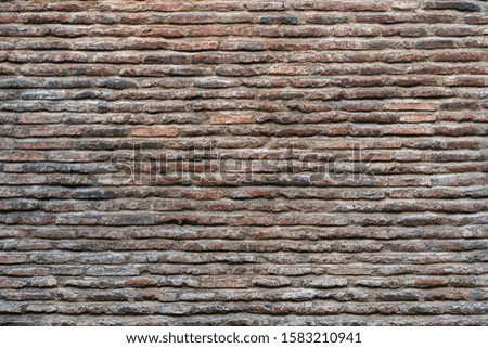 Brick wall of an old fortress. Ancient masonry. High resolution image. Background, texture.