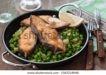 Pan Seared Halibut with Vegetables and Green Peas as Side Dish