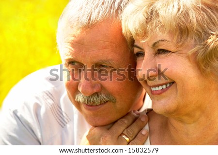 Smiling happy  elderly couple in love outdoor
