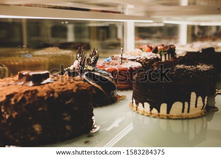 Showcase with delicious pastries, pastry shop