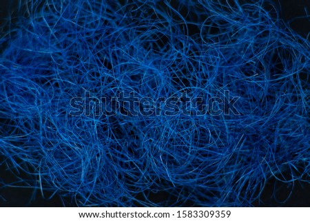 
Blue fiber, on a black background, color of the year 2020