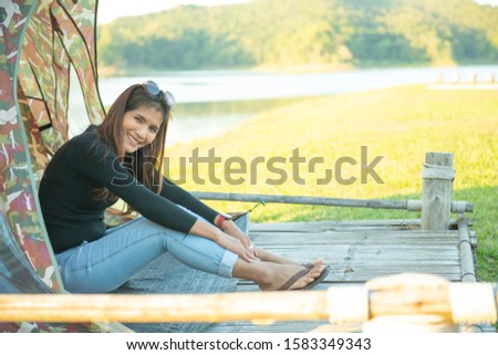 Asia woman with camping tent, Thailand.