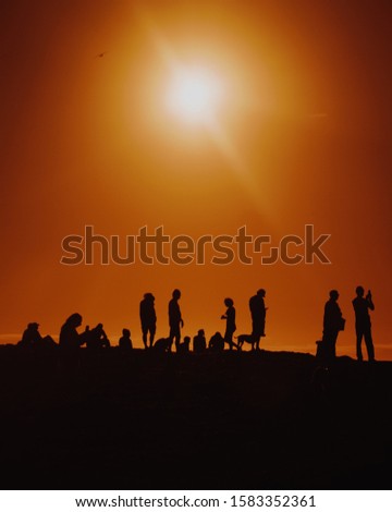 People Standing On The Cliff (Silhouettes)