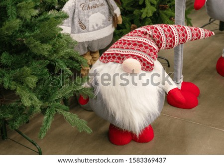 Funny  fabulous gnome with a big white beard -  gift for    New Year and Christmas 