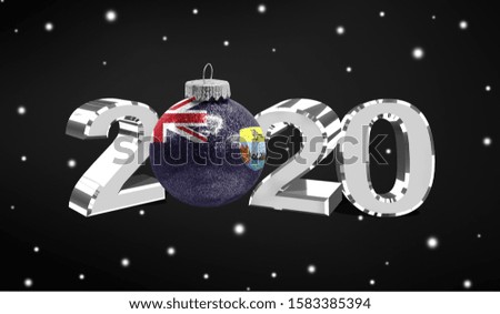 Happy new Year 2020, flag of Saint Helena on a christmas toy, decorations isolated on dark background. Creative christmas concept.