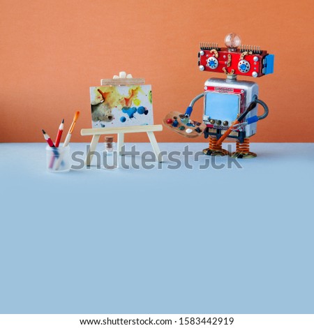 Robot artist paints an abstract picture with watercolors. Wooden easel and artist's tools palette, pencils case. Advertising poster studio school of visual arts interior. copy space