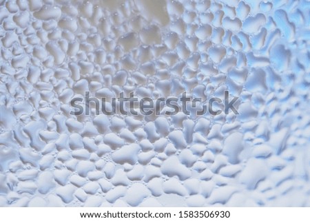 Abstract water drops on glass surface texture