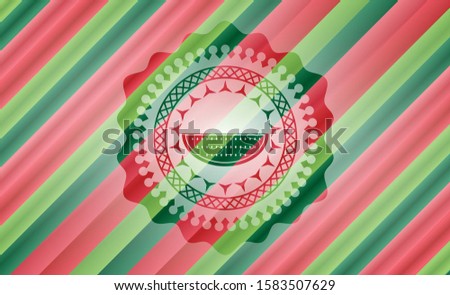 watermelon icon inside christmas colors emblem.